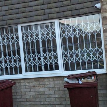 Made to measure collapsible gates Stanmore for secure shopfronts and side entrance protection