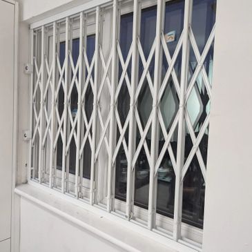 Expandable collapsible gates London manufactured for modern business security systems