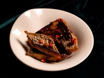 Deep fried fish in special sour & sweet sauce, served cold