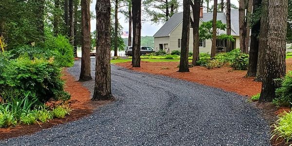 Blue stone spread on driveway.