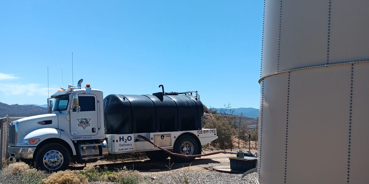 Southwest Water Truck filling a rural community water tank