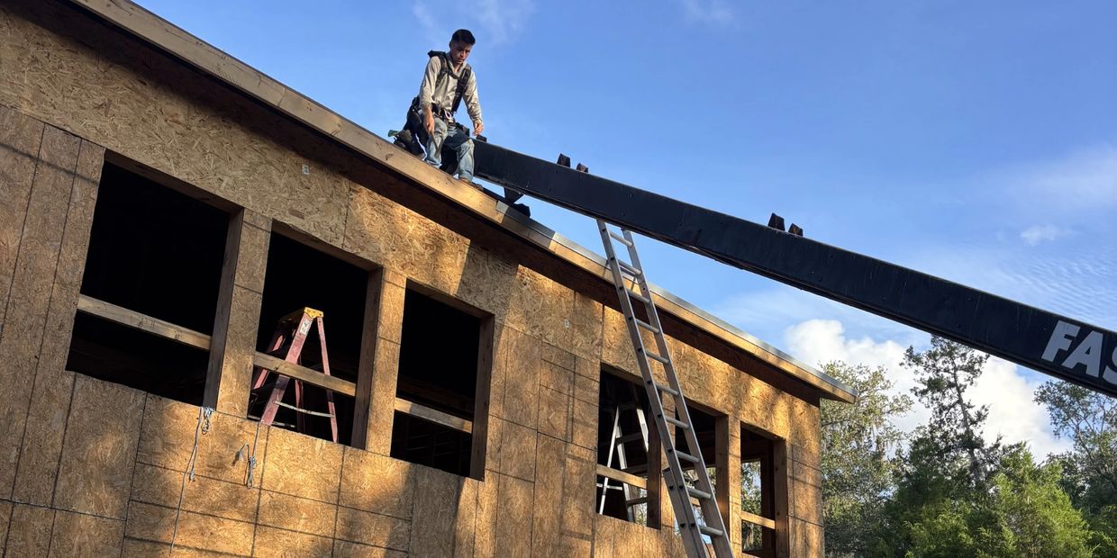 Roof replacement workmen in Brooksville, Florida.
