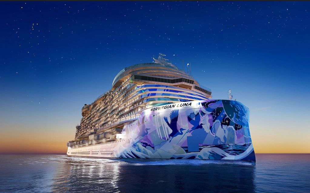 Cruise ship Norwegian Luna sailing at dusk.