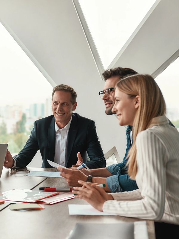 A team of business people in a office meeting