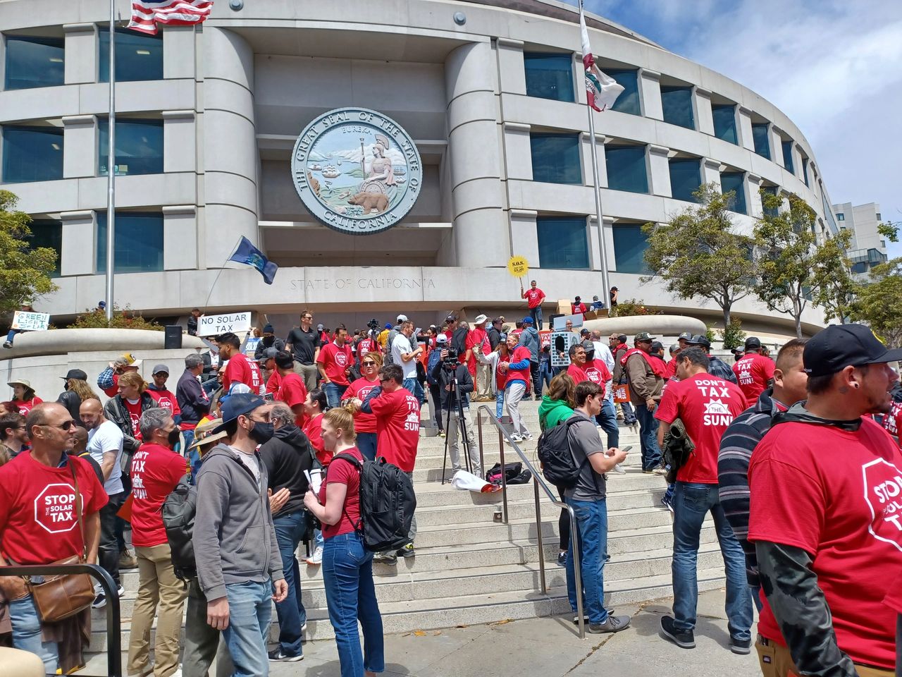 Solar employees and advocates gather at the CPUC in San Francisco on June 2, 2022