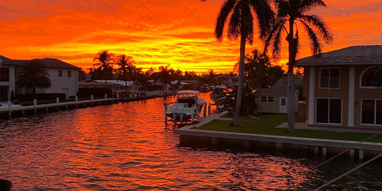 A sunset cruise boat rental in the water in Pompano Beach, FL