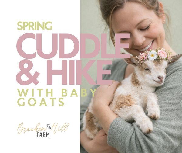 Woman cuddling a baby goat wearing a flower crown, promoting spring hikes.