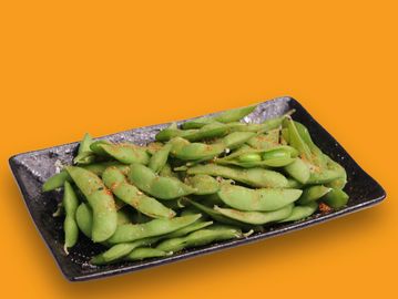 Plate of seasoned edamame beans.