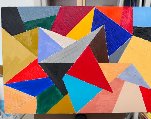 Colorful abstract geometric painting with various triangles.