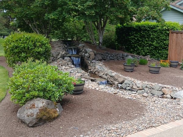 Water Feature pondless waterfall cascading stream bed in mcminnville oregon