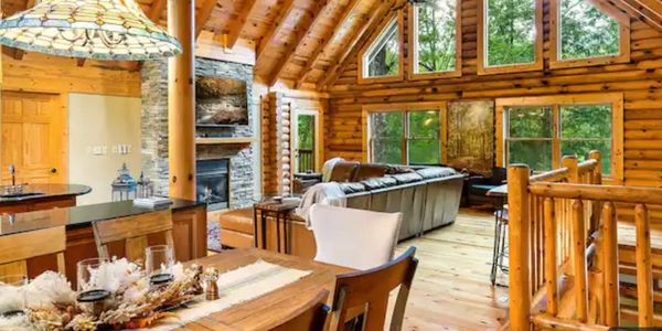 Open kitchen and living room of vacation cabin in East Tennessee professionally designed 