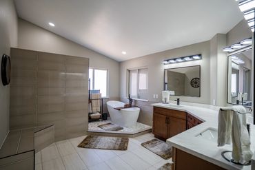 Luxury bathroom remodel Las Vegas 2026 - walk-in shower with large format tile by Vegas Pro Remodeli