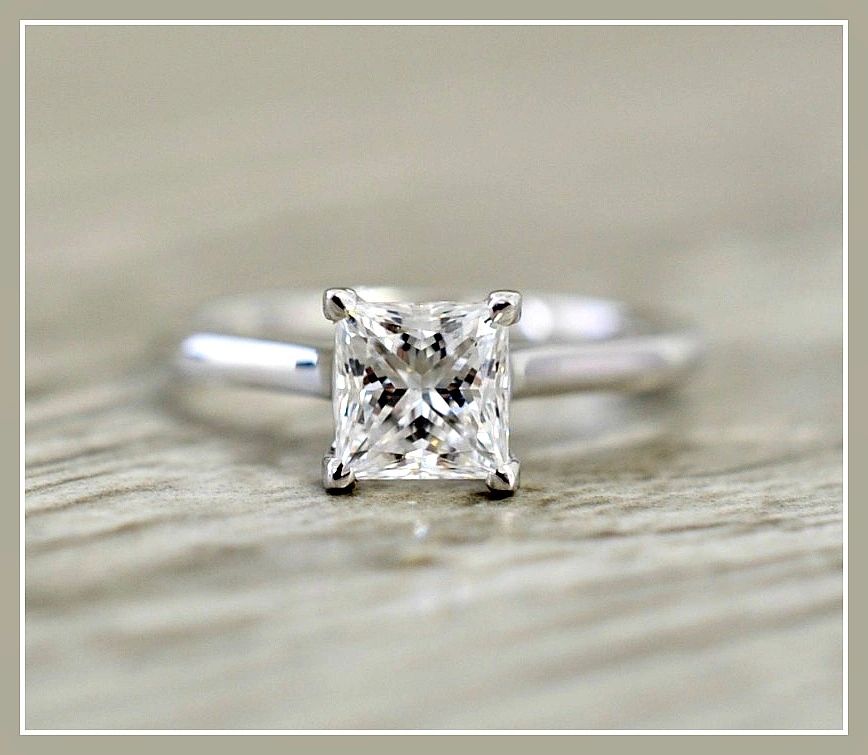 Princess cut solitaire engagement ring in 14 karat white gold setting