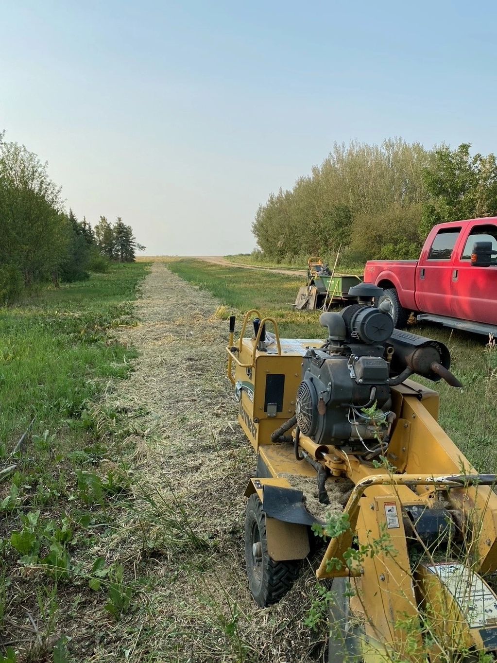 Hedgerow root clearing at a farm near Regina.