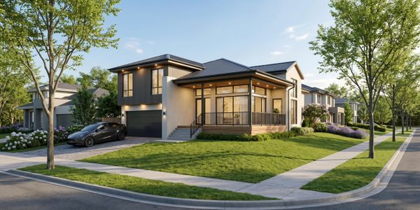 Modern house on a sunny corner lot with a car in the driveway.