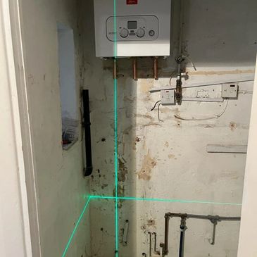 New boiler installation with wall prep and laser alignment London
