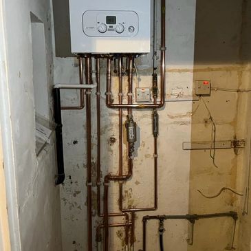 Completed gas boiler and pipework installation by certified engineer London

