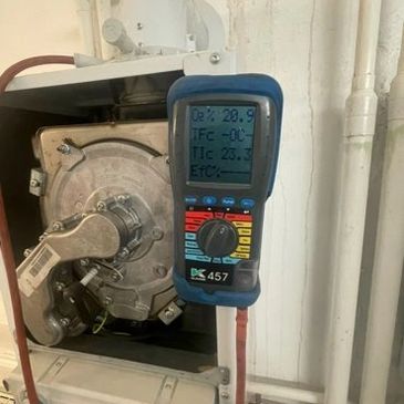 Gas boiler flue and burner inspection using Kane 457 for CP12 gas safety certification