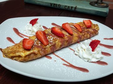 Ricotta Cheese and Vanilla Strawberries Stuffed Crepe. 