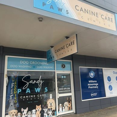 Exterior view of Sandy Paws Canine Care Centre offering grooming and dog walking.