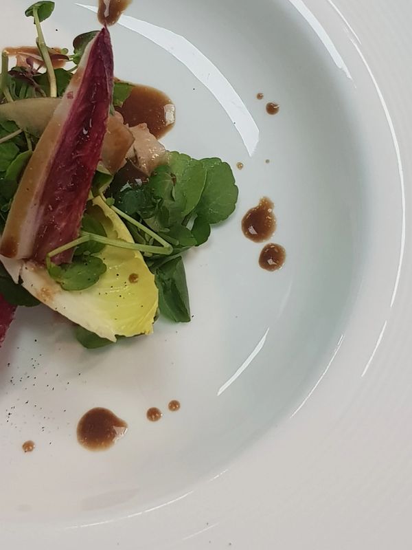 Duck confit with peppery leaves and sherry dressing