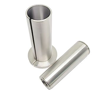 Two shiny metal cylindrical parts, one upright and one lying down.