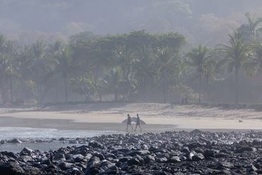 Surfers in Troncones Beach