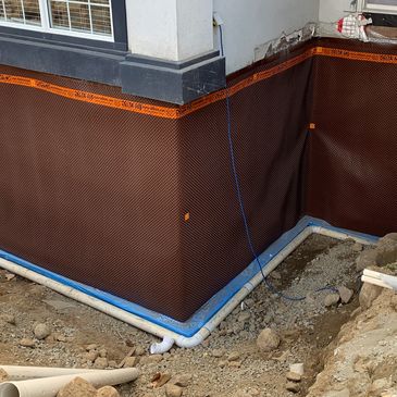 Exposing the wooden foundation. Repairing, drying and waterproofing it. Restored the front yard. 