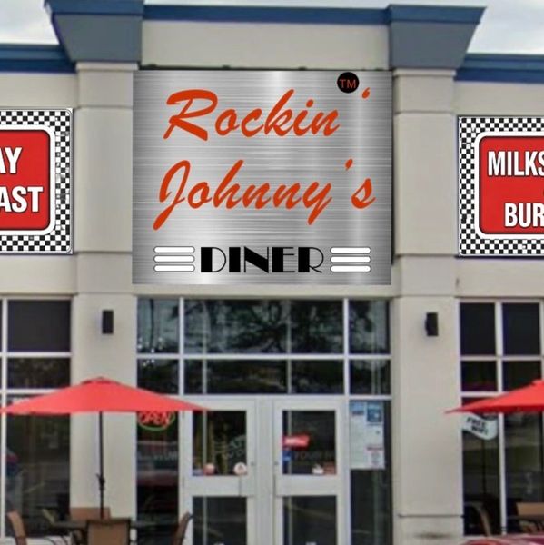 Entrance of Rockin Johnny's Diner with outdoor seating.