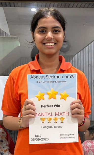 Girl smiling with a Mental Math certificate.
