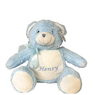 Custom embroidered name on child's teddy bear