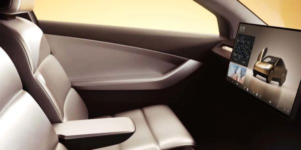 Modern car interior with touchscreen display.