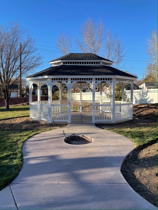 CountryLane Gazebos 16x20 Oval Gazebo with pagoda roof on concrete in landscape in Kaysville, Utah