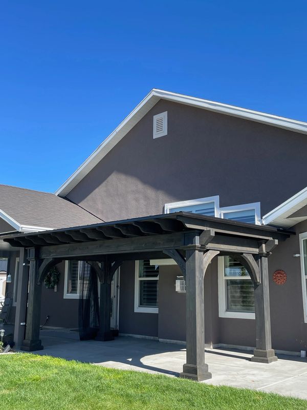 Country Lane Gazebos Santa Fe Pavilion  next to screened porch in West Haven, Utah