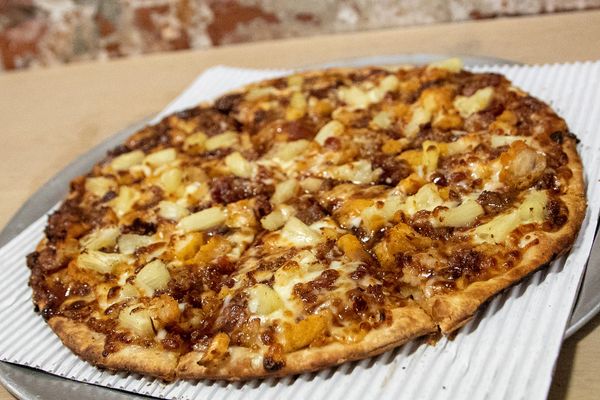 Fresh baked pizza topped with cheese and bacon served at Urbana Brewing Co. in downtown Urbana, Ohio