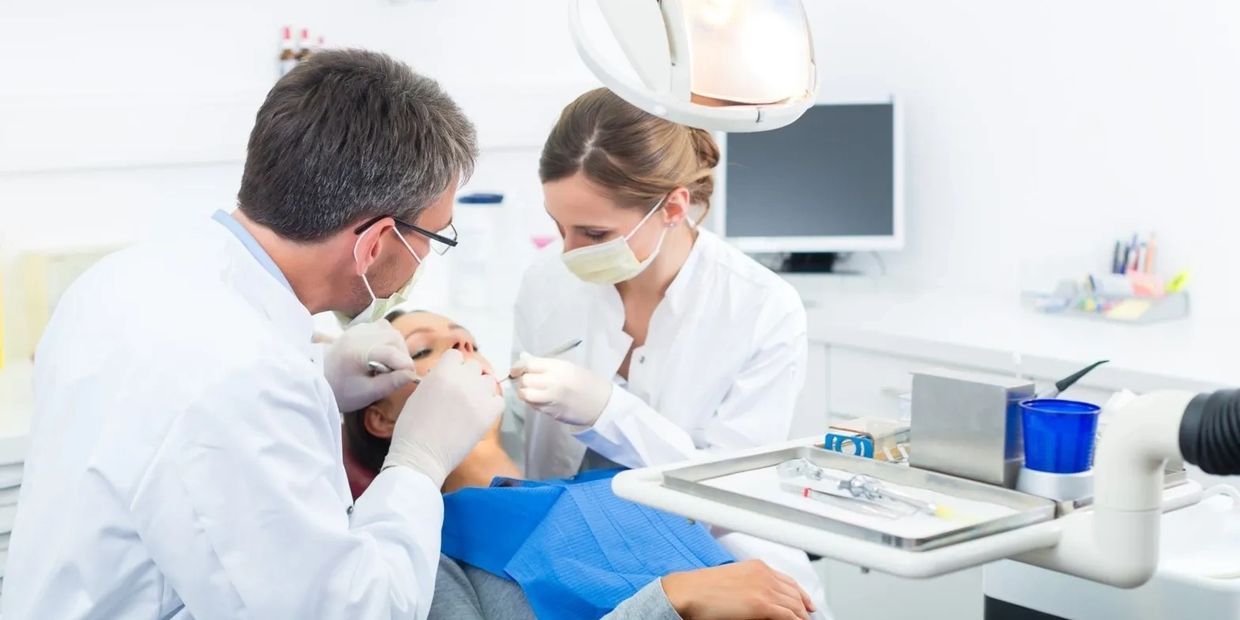 Dental team working on patient