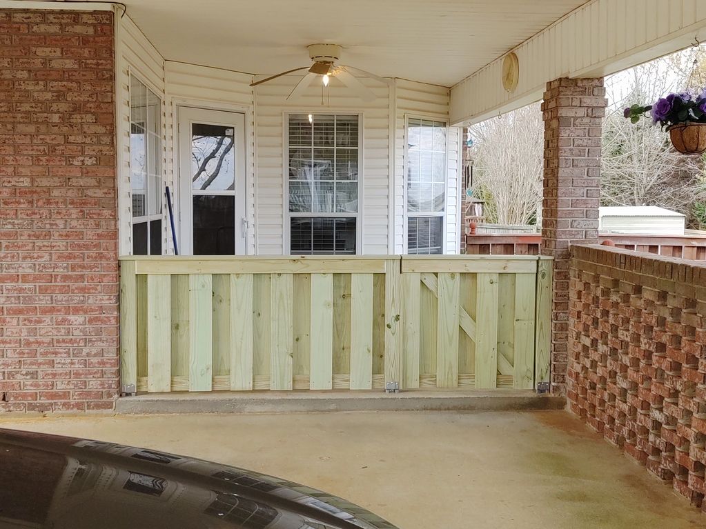 Porch in Millbrook, AL after fence was constructed.