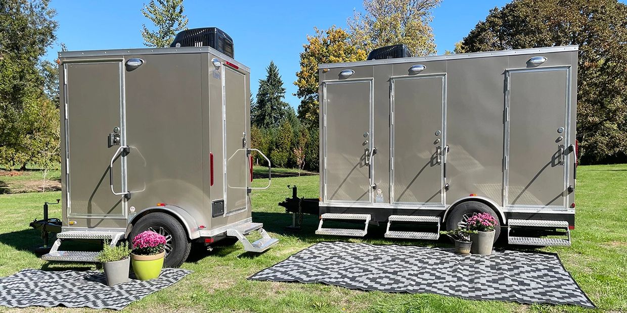 Two luxury restroom trailers