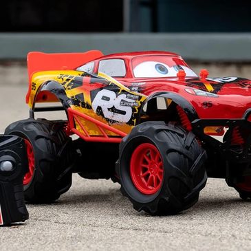 Red remote control monster truck toy.