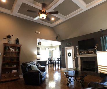 Interior work on ceiling, coffered ceiling.  Accent wall painted