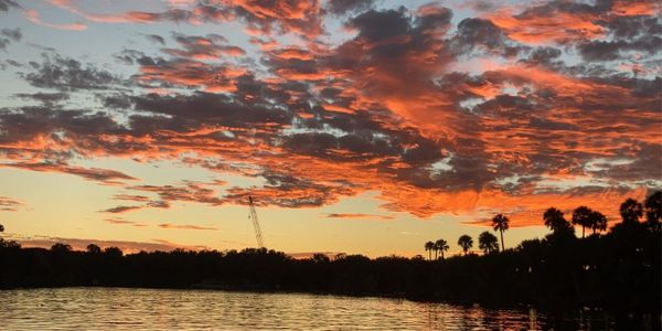 Stunning sunset over Halifax Harbor Marina in Daytona Beach, FL, with AVS Marine's crane silhouetted against the vibrant sky. Showcasing our commitment to excellence in marine construction. #MarineConstruction #HalifaxHarbor #DaytonaBeach