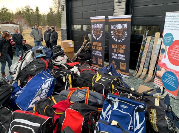 Hockey bags and sticks at Noranda Spring Classic event.