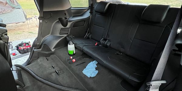 Interior deep clean detail. Vacuum, microfiber, brush, & product cleaner.