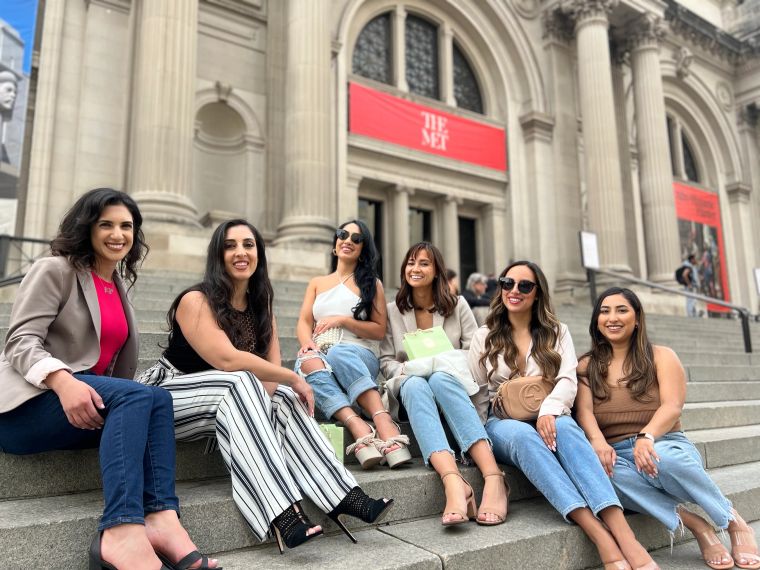 Gossip Girl Tours guests at a famous filming location stop in New York City