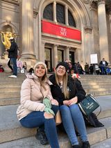 Friends posing at an Upper East Side Gossip Girl filming location in New York City