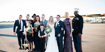 bride and groom with kids and others 