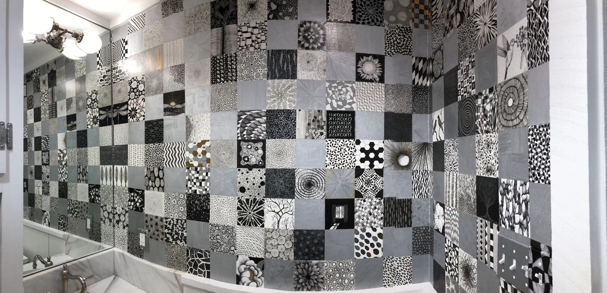 This bathroom was remodeled with 278 individual 5"x 5" pen and ink drawings by Tamara Robertson.