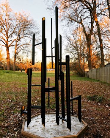 Outdoor view of sculpture "Black Gold."