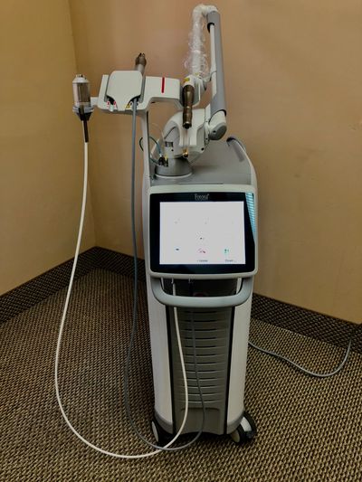 Holistic dental multiple wavelength laser