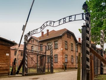 Entrance gate of Auschwitz concentration camp with the infamous slogan.